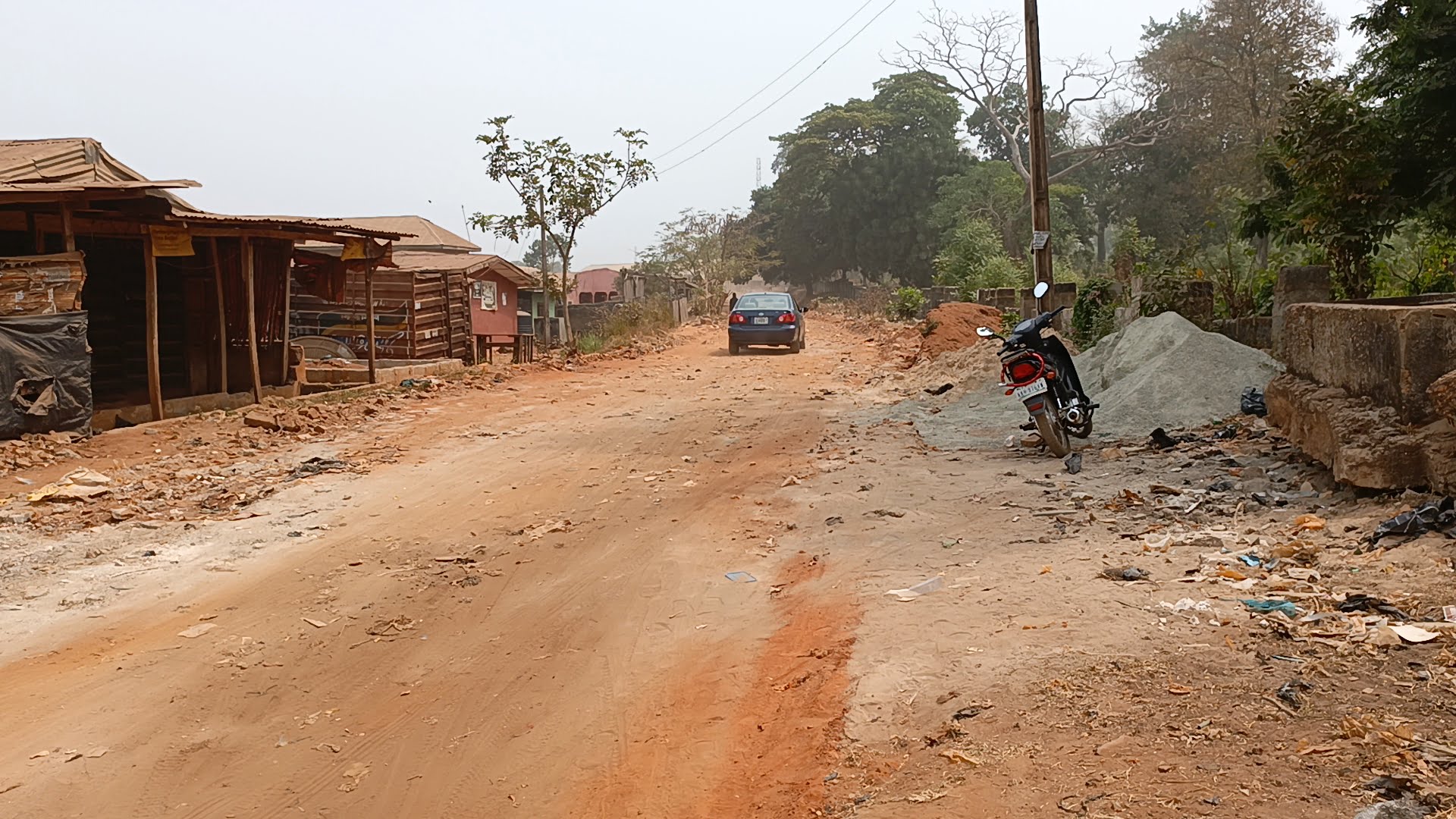 Mixed Reactions Trail Grading of Cemetery Road, Others in Etsako West LG